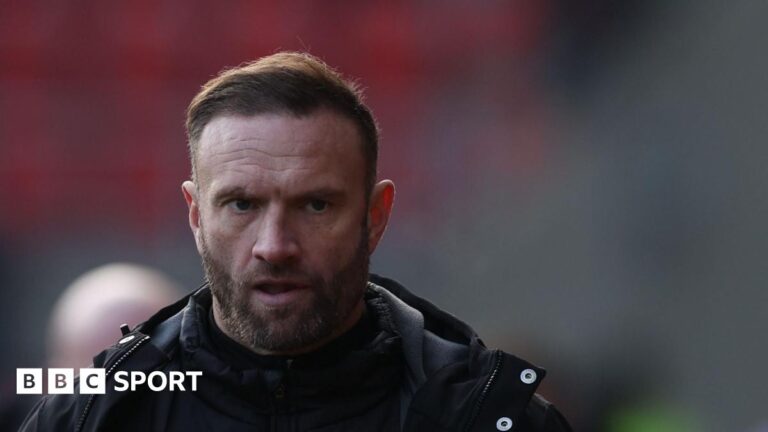 Ian Evatt on the touchline